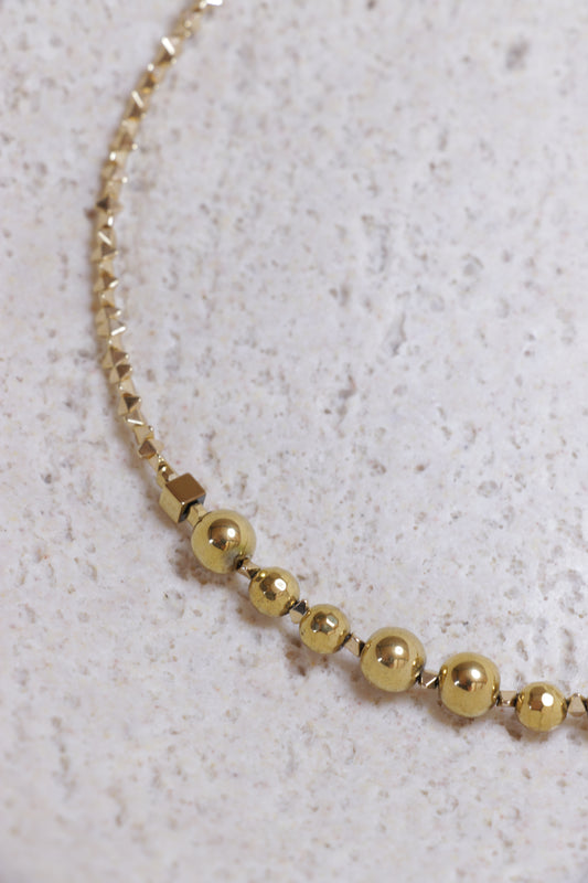 Collier tour de cou DHĀRANA Hématite Plaquée Or 🜃 Je me tiens. Je suis stable.