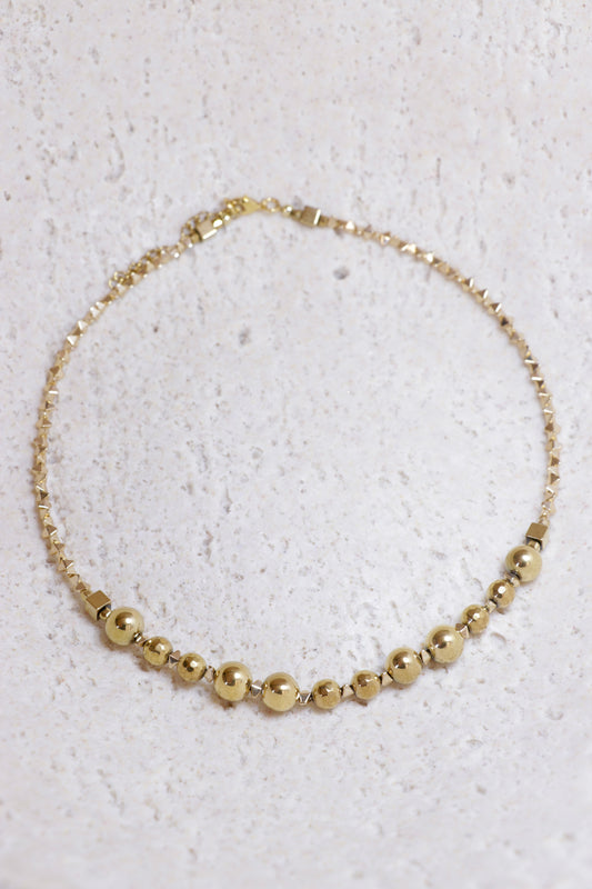 Collier tour de cou DHĀRANA Hématite Plaquée Or 🜃 Je me tiens. Je suis stable.
